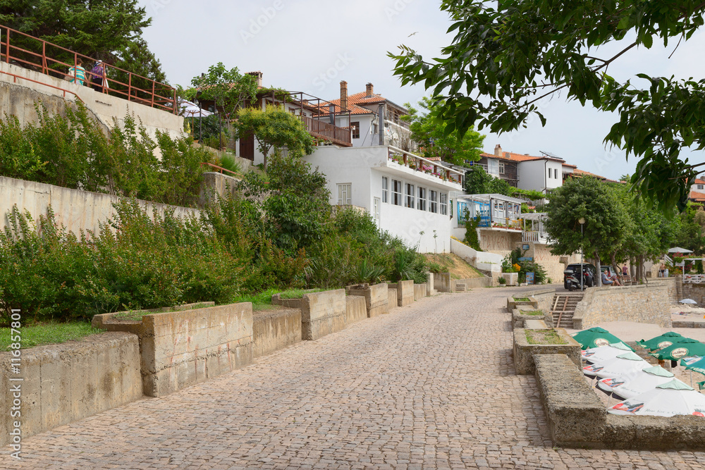 NESSEBAR, BULGARIA, JUNY 18, 2016: Nessebar promenade with cozy cafes and small beaches