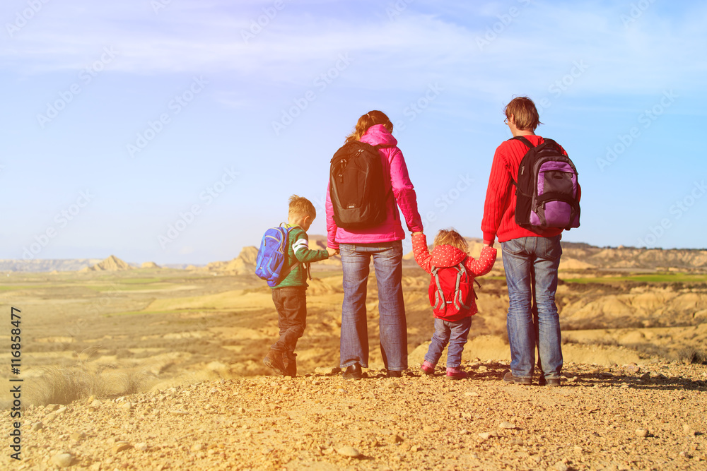 family with two kids travel in scenic mountains family with two kids travel in scenic mountains