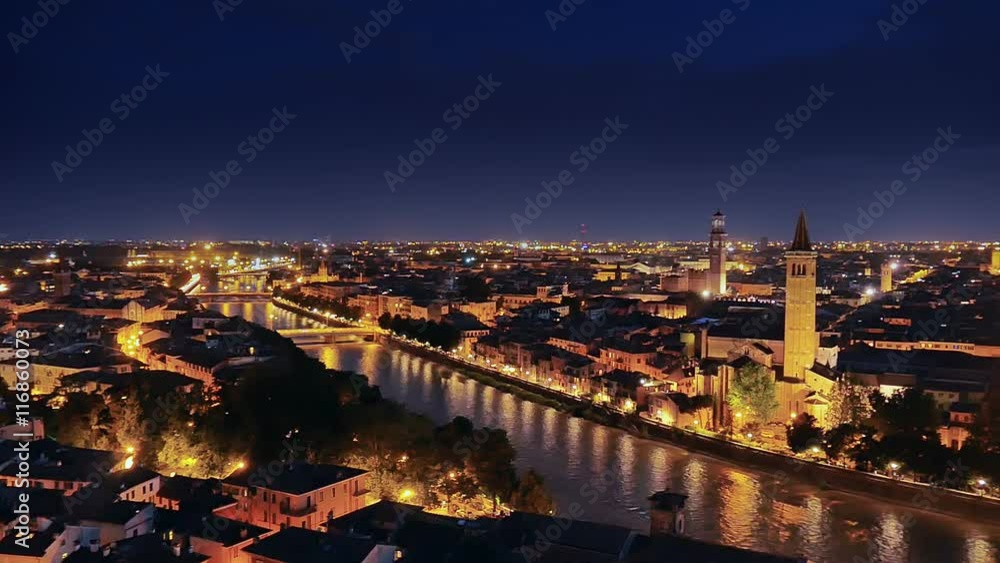 verona cityscape a night pan as seen from an high point of view verona cityscape a night pan as seen from an high point of view
