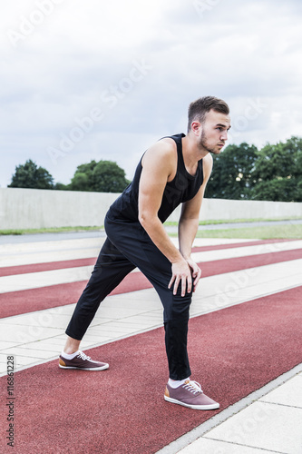 Athlete preparing for training or competitions on running track