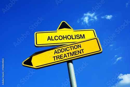 Alcoholism vs Addiction treatment - Traffic sign with two options - appeal to overcome addictive alcohol abuse and dependence through detoxifiction, treatment, rehabilitation and abstinence 