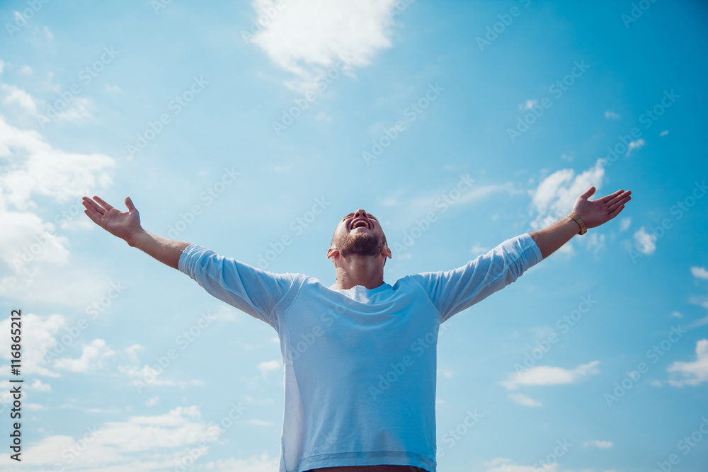 The man held out his hands to the sky. Freedom. The man held out his hands to the sky. Freedom.