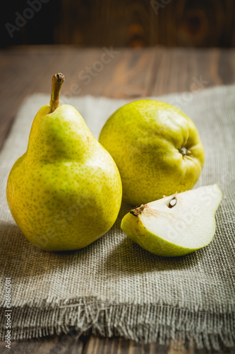 Fresh ripe pears on a table with napkin