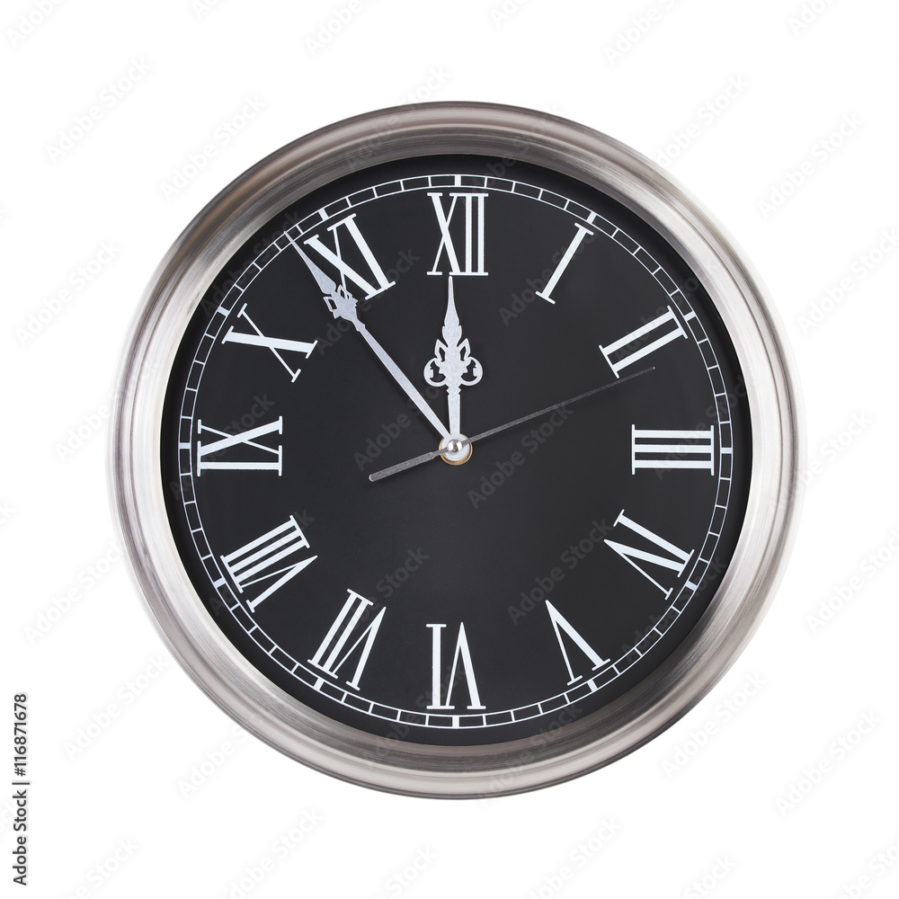 Office clock shows five minutes to twelve Office clock shows five minutes to twelve