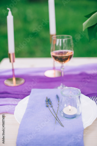 beautifully served table outdoor with flowers and decor