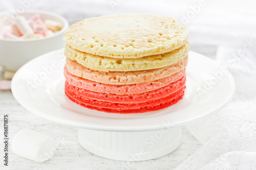 Delicious colorful pancakes for breakfast photo