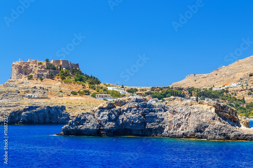 rocks in the sea near the ancient city of Lindos, view from the sea