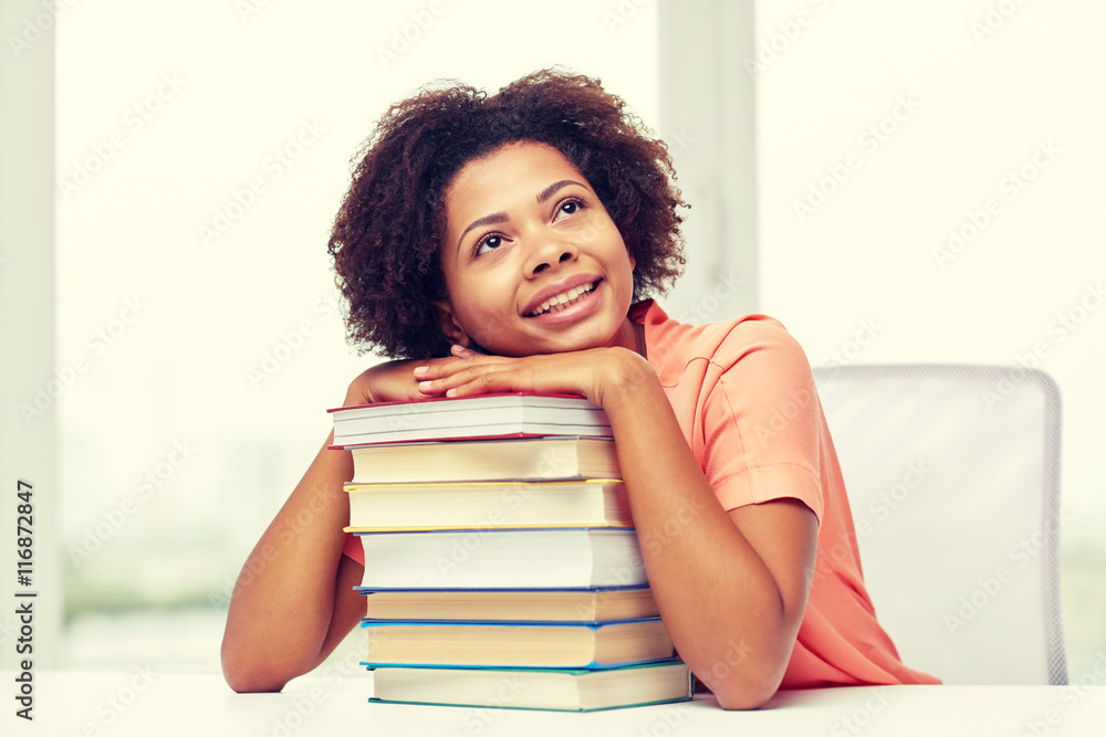 happy african student girl with books at home happy african student girl with books at home