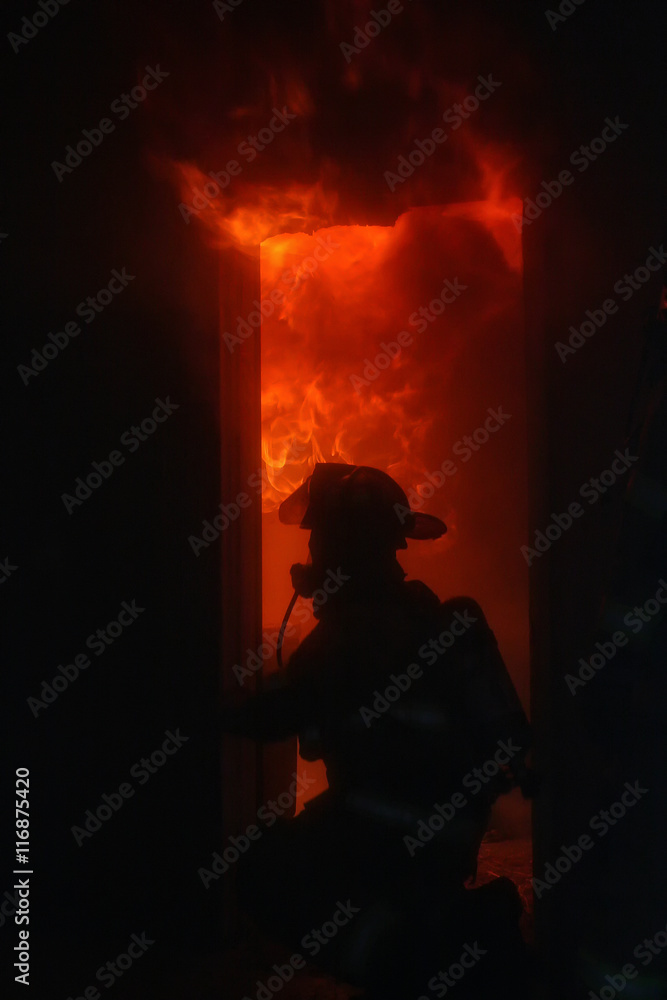 Fototapeta premium Fully involved House Fire During A Training Exercise