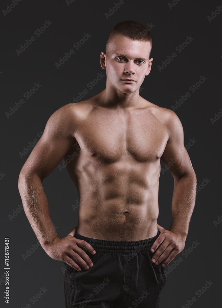 Healthy muscular young man. Sport portrait.