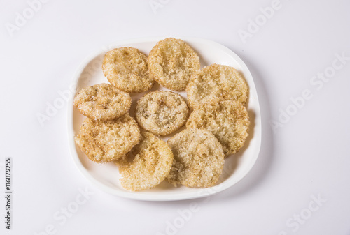 Anarsa is an authentic Maharashtrian sweet dish especially made in the festive season photo