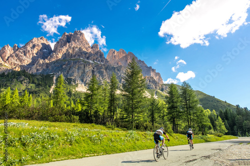 Bike on the road with mountain view in Dolomites, Italy