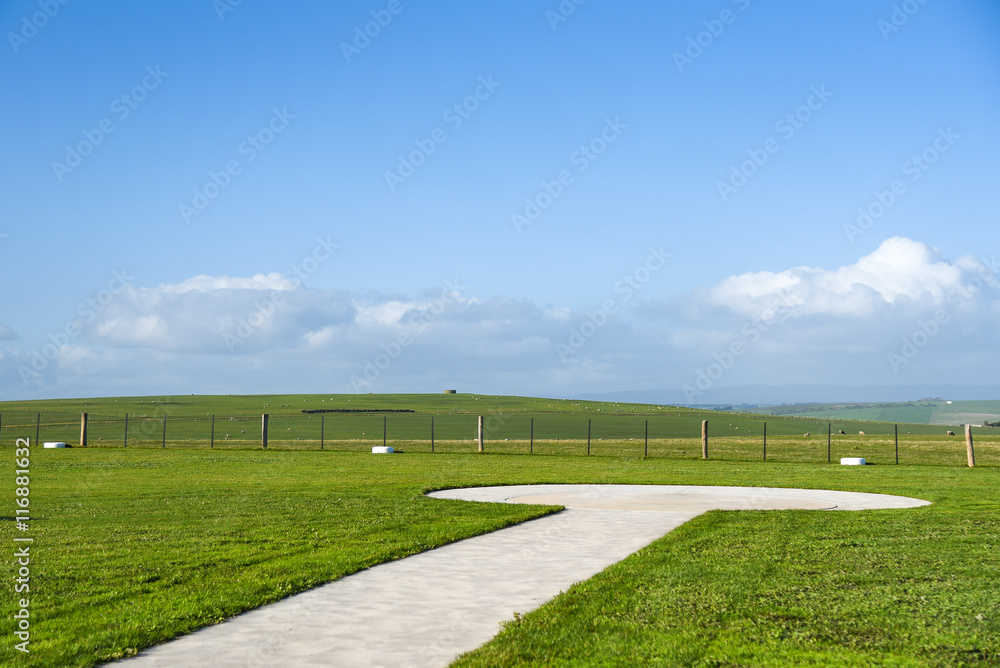 Obraz premium Helicopter landing platform on green field