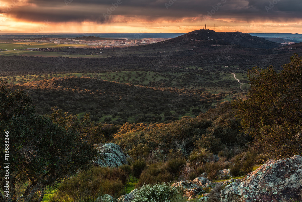 Sunset with the city of Caceres in the background. Spain.