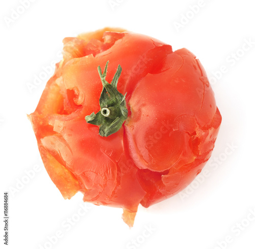 Isolated crushed tomato on a white background.