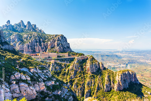 View of the Monastery of Montserrat in Catalonia, near Barcelona. Panorama from the top of the mountain. photo