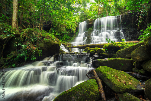 beautiful waterfall in green forest in jungle at phu tub berk mo © martinhosmat083