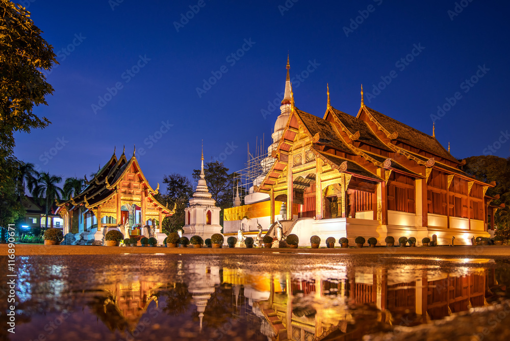 Fototapeta premium Beautiful Wat Phra Sing temple,Reflection in standing water Chi