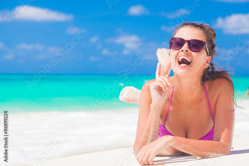 portrait of a young woman having fun at beach