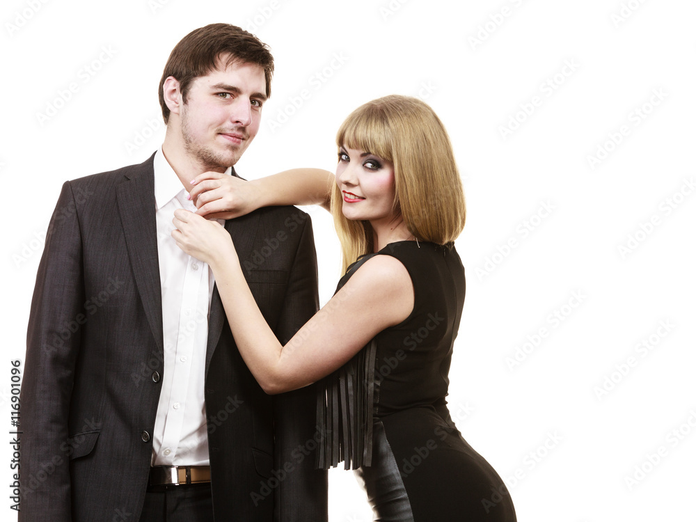 Woman helping man dress up elegant clothes. Woman helping man dress up elegant clothes.