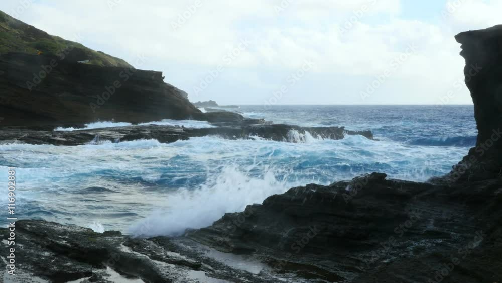 Ocean waves and the rugged shore of Hawaii Ocean waves and the rugged shore of Hawaii