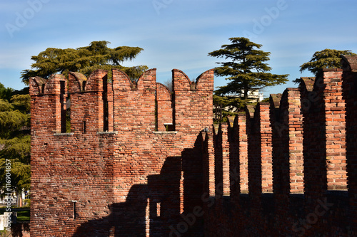 Medieval Scaliger Bridge in Verona with its charateristic ghibelline battlements photo