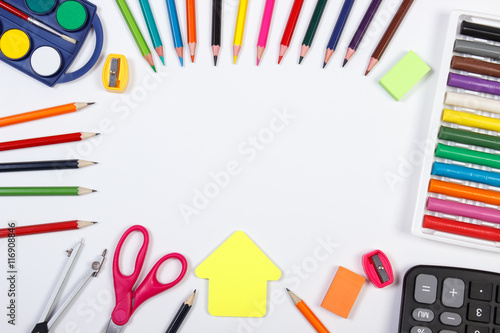School accessories and shape of building on white background, back to school concept, copy space for text