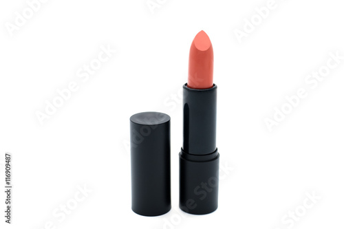 Matte brick orange lipstick isolated on white background