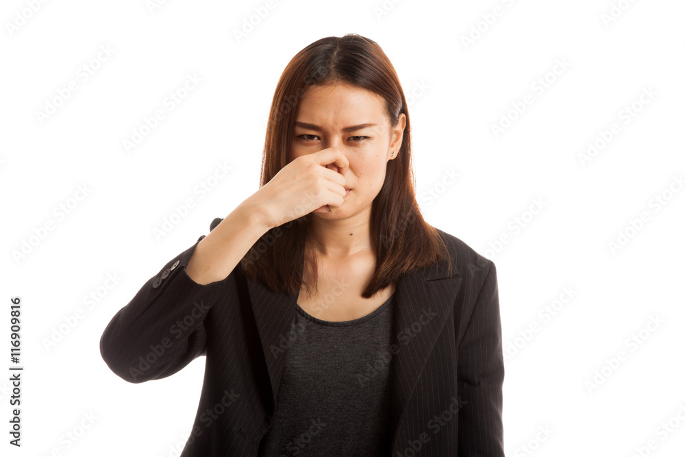 Young Asian woman holding her nose because of a bad smell. Young Asian woman holding her nose because of a bad smell.