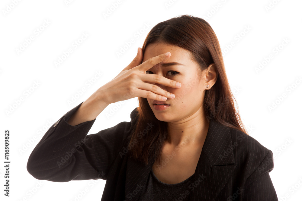 Beautiful young Asian woman peeking through fingers. Beautiful young Asian woman peeking through fingers.