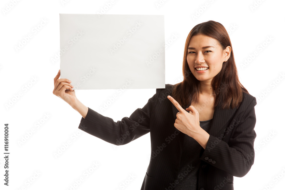 Young Asian business woman point to blank sign. Young Asian business woman point to blank sign.