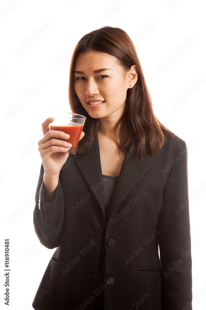 Young Asian business woman drink tomato juice. Young Asian business woman drink tomato juice.