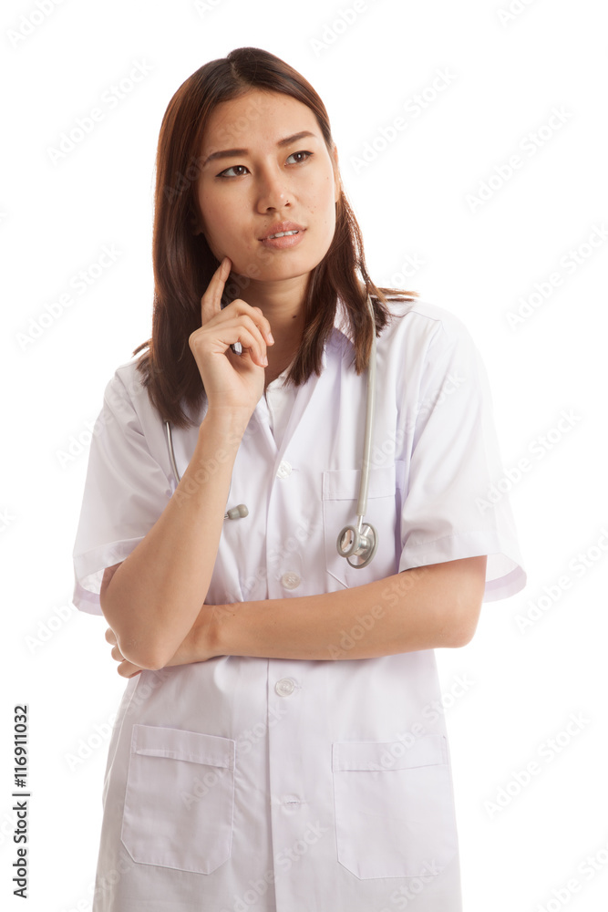 Asian young female doctor thinking looking up. Asian young female doctor thinking looking up.