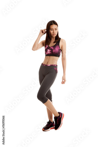 Fototapeta Naklejka Na Ścianę i Meble -  Beautiful Asian healthy girl in sport dress