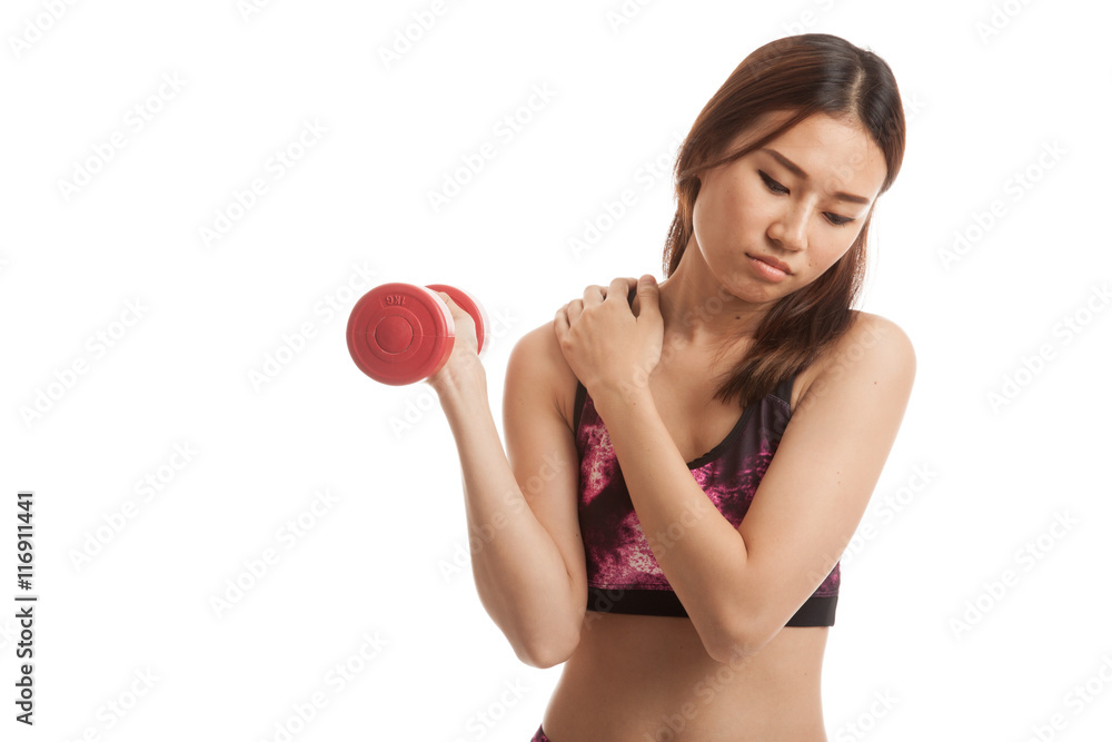 Asian healthy girl got shoulder pain with dumbbell. Asian healthy girl got shoulder pain with dumbbell.
