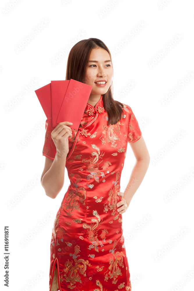 Asian girl in chinese cheongsam dress with red envelope. Asian girl in chinese cheongsam dress with red envelope.
