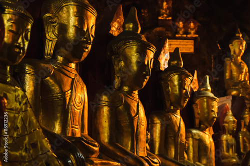 Golden Buddha statues in Pindaya Caves, Myanmar photo