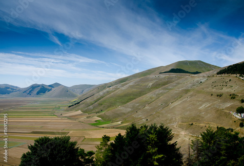 castelluccio norcia panorama of green hills Summer