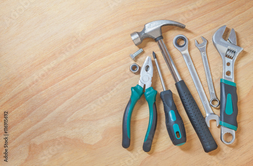 Tools on a wooden background