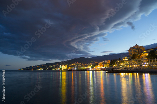 Evening Seaside City and Clouds