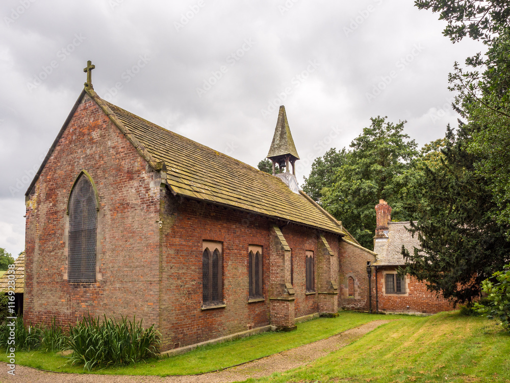 Styal, Cheshire, UK. July 26th 2016. Quintessential english village church in Styal village on a cloudy summer day, Styal, Cheshire, UK
