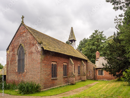 Styal, Cheshire, UK. July 26th 2016. Quintessential english village church in Styal village on a cloudy summer day, Styal, Cheshire, UK