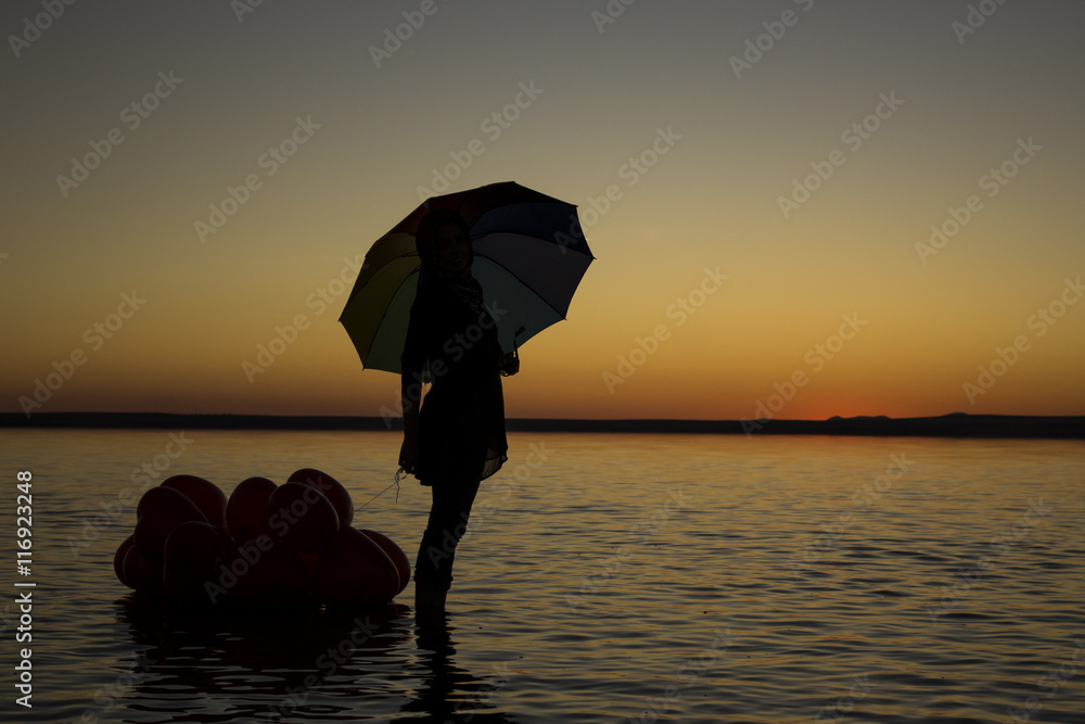 Turkey Salt lake sunset silhouette umbrella woman