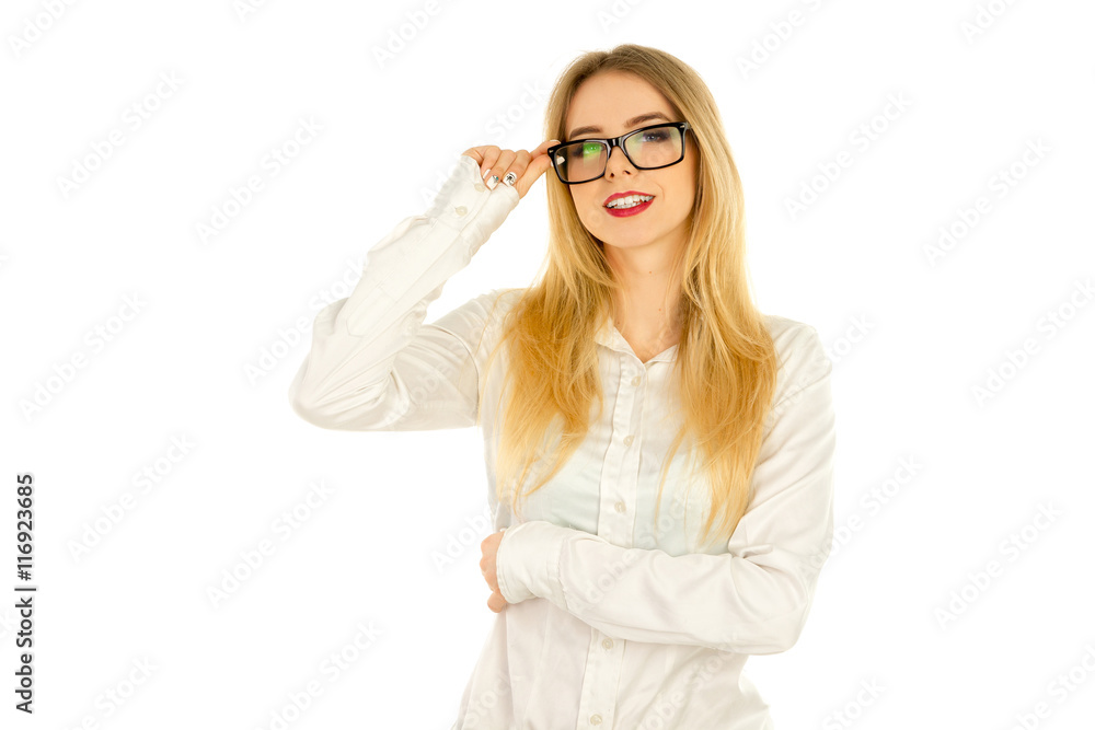 woman in glasses and shirt smiling