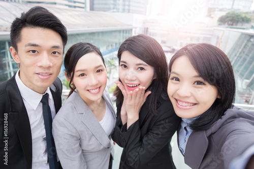 Canvas Print businesspeople smile happily in hongkong