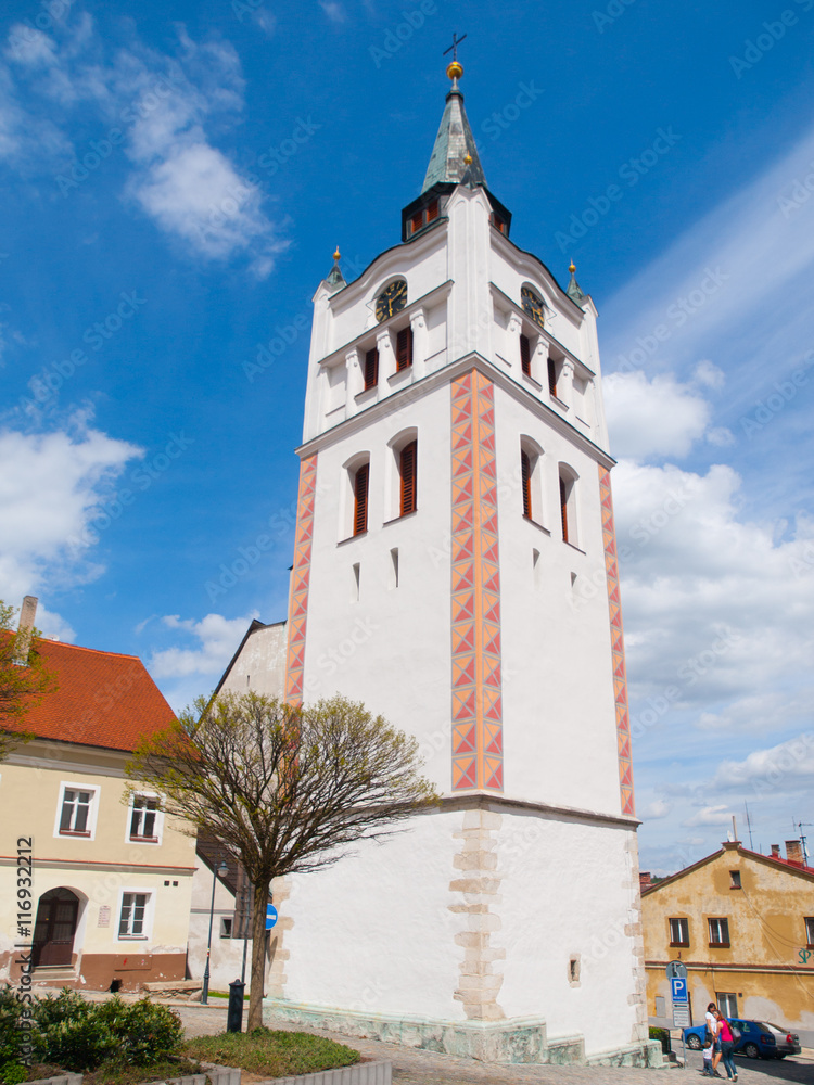 White bell tower in the historical centre of Vimperk, Southern Bohemia, Czech Republic
