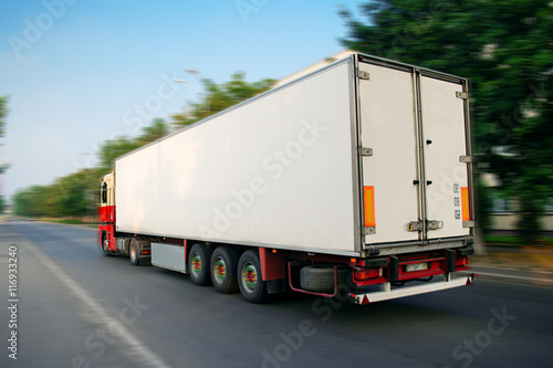 truck in motion of blured road