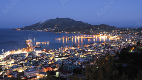 Zakynthos panorama over the capital city Zante Town at night wit