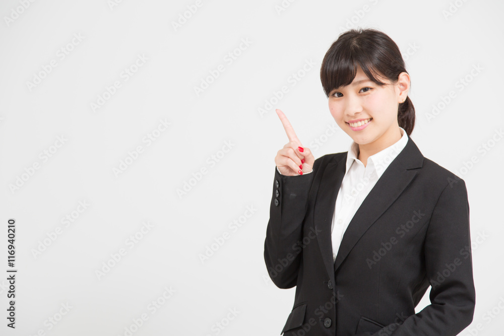ポーズをとるスーツの女性 ポーズをとるスーツの女性