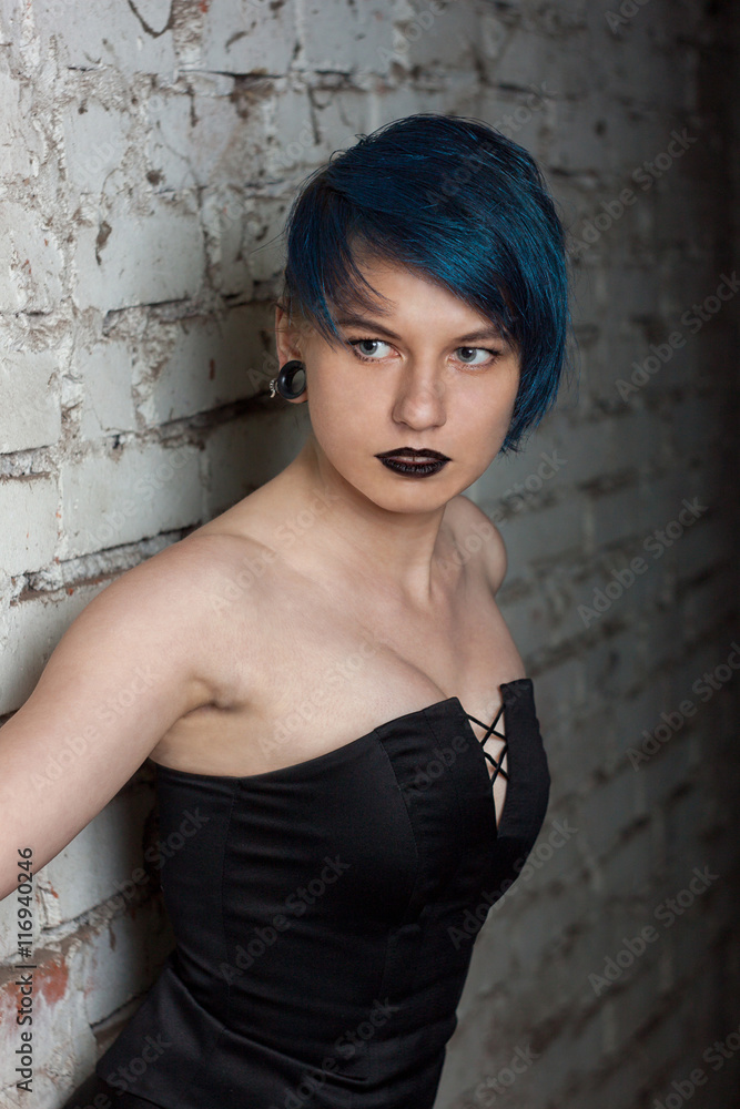 Fashion portrait of a beautiful woman with blue hair Fashion portrait of a beautiful woman with blue hair